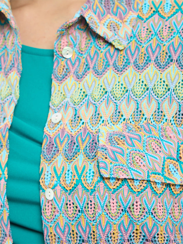 Blusa camisera oversize con bolsas de parche al frente