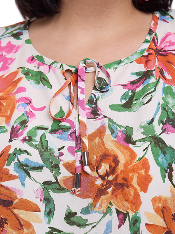 Blusa de escote redondo con cintas y valenciana en sisa