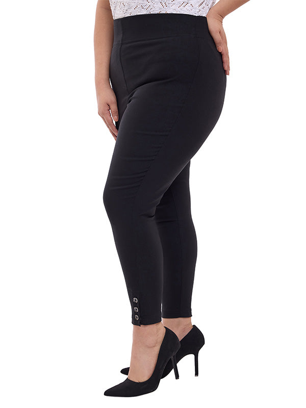 Pantalón tipo legging con botones en ruedo