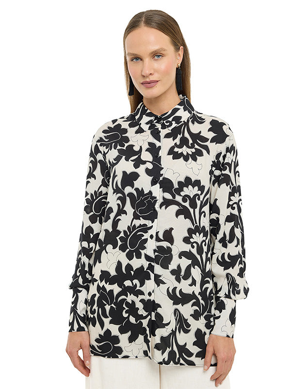 Blusa camisera tipo túnica amplia con puño ancho