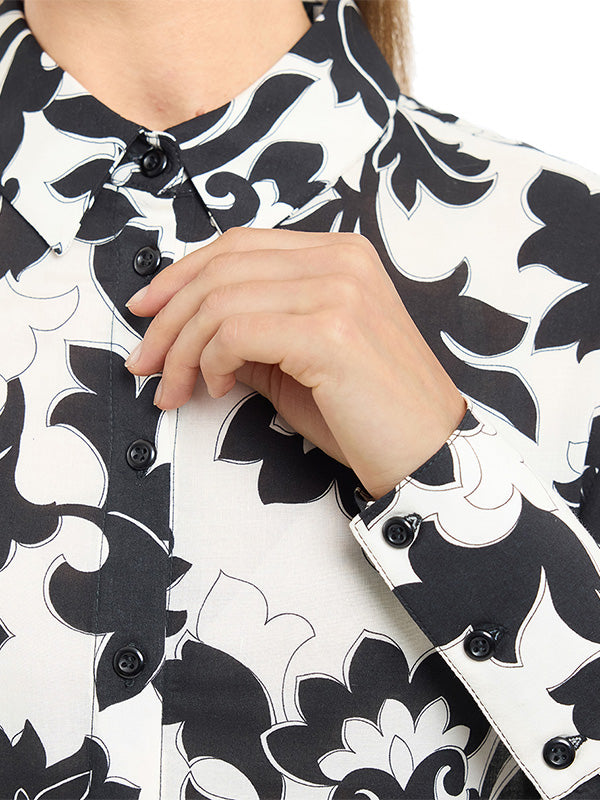 Blusa camisera tipo túnica amplia con puño ancho