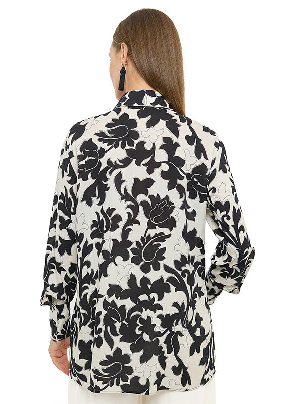 Blusa camisera tipo túnica amplia con puño ancho