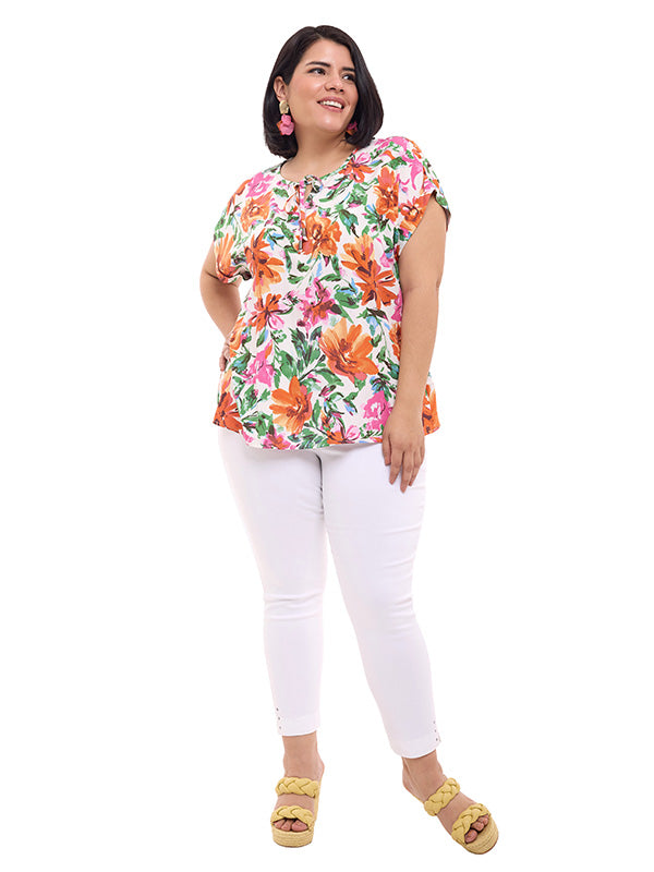 Blusa de escote redondo con cintas y valenciana en sisa