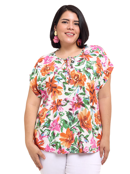 Blusa de escote redondo con cintas y valenciana en sisa