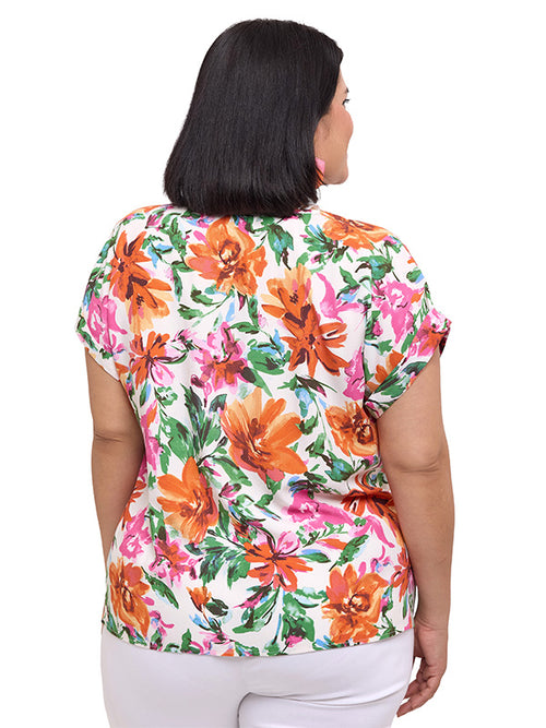 Blusa de escote redondo con cintas y valenciana en sisa