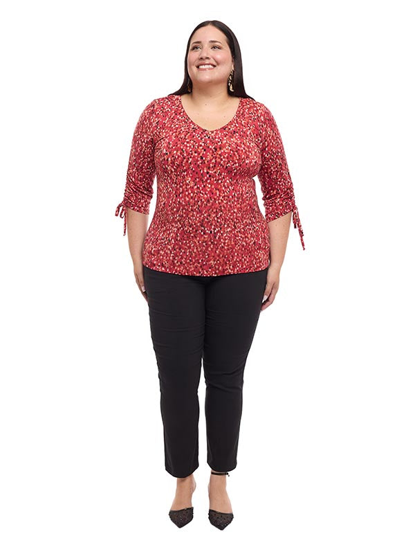 Blusa estampada con mangas y jaretas