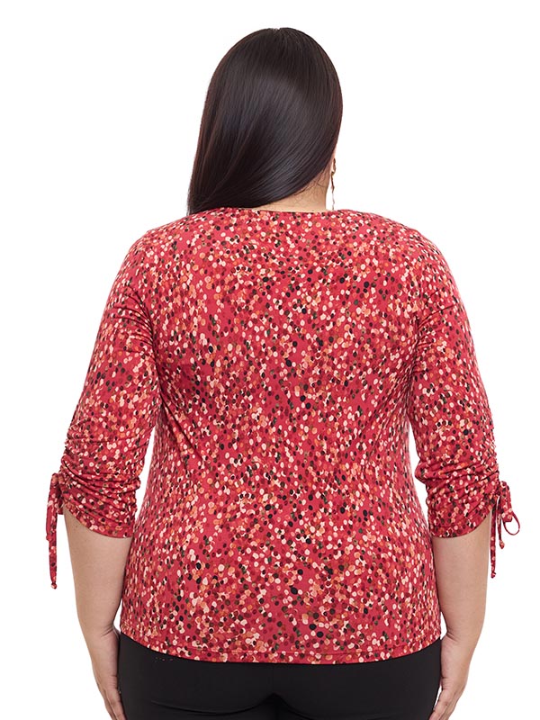 Blusa estampada con mangas y jaretas