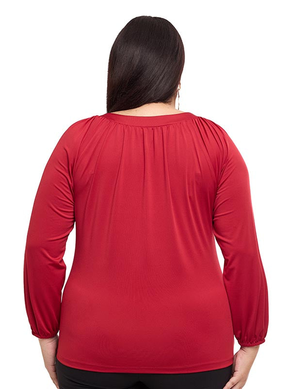 Blusa lisa con herraje en escote